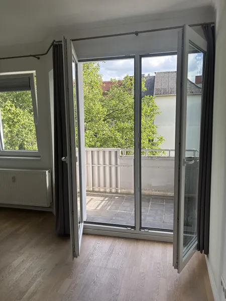 Lichtdurchflutete Dachgeschoss Single Wohnung in zentraler Lage